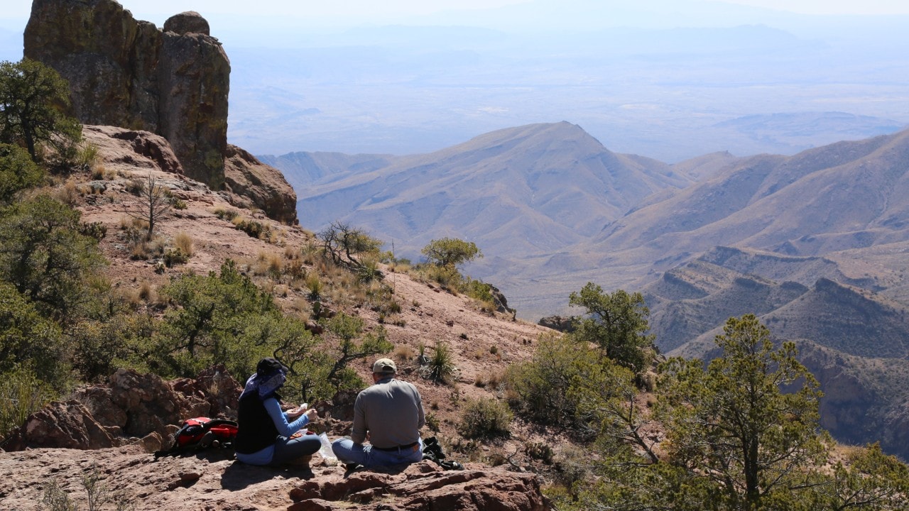 Hikers enjoy a picnic at the end of the Lost Mine Trail Hike.