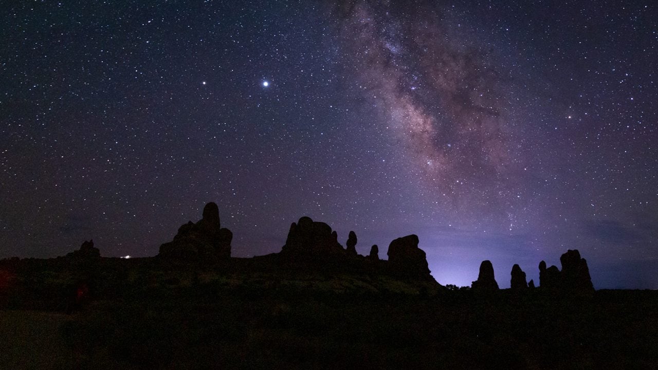 The Milky Way glows bright in Arches National Park