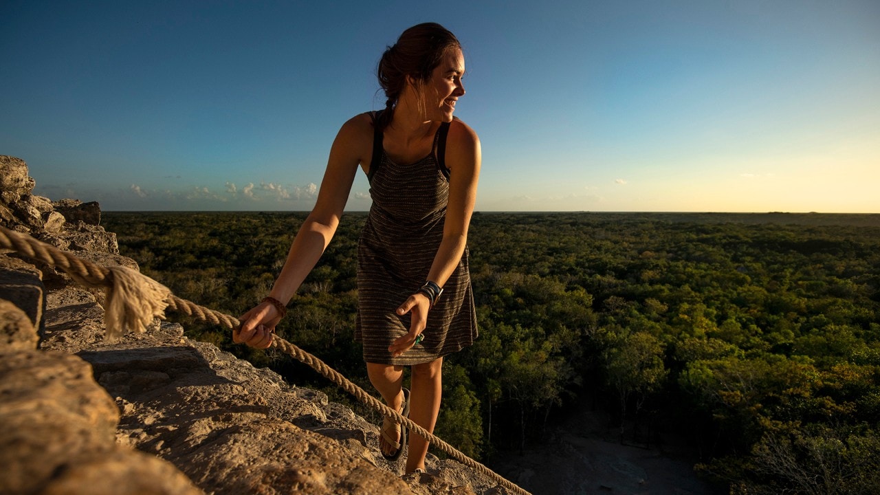 Kassondra climbs the Nohoch Mul pyramid at Cobá, an ancient Mayan city.