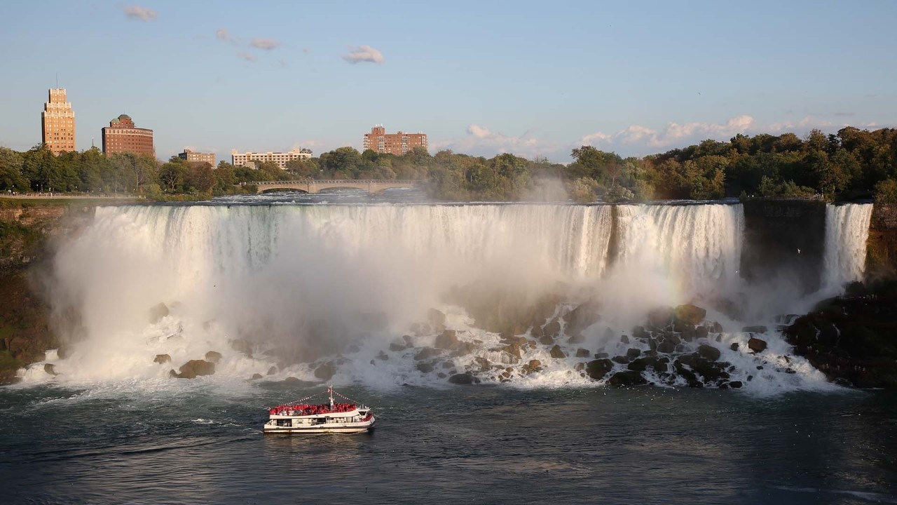 Hornblower Niagara Cruises takes tourists past American and Bridal Veil falls.