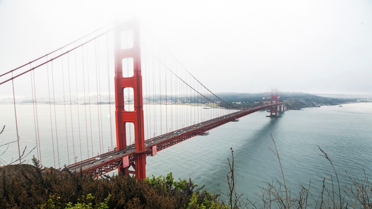 The Golden Gate Bridge features 746-foot-tall towers and art deco architecture.