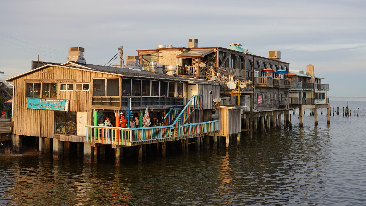 Waterfront buildings in historic downtown Cedar Key as seen from the fishing pier.