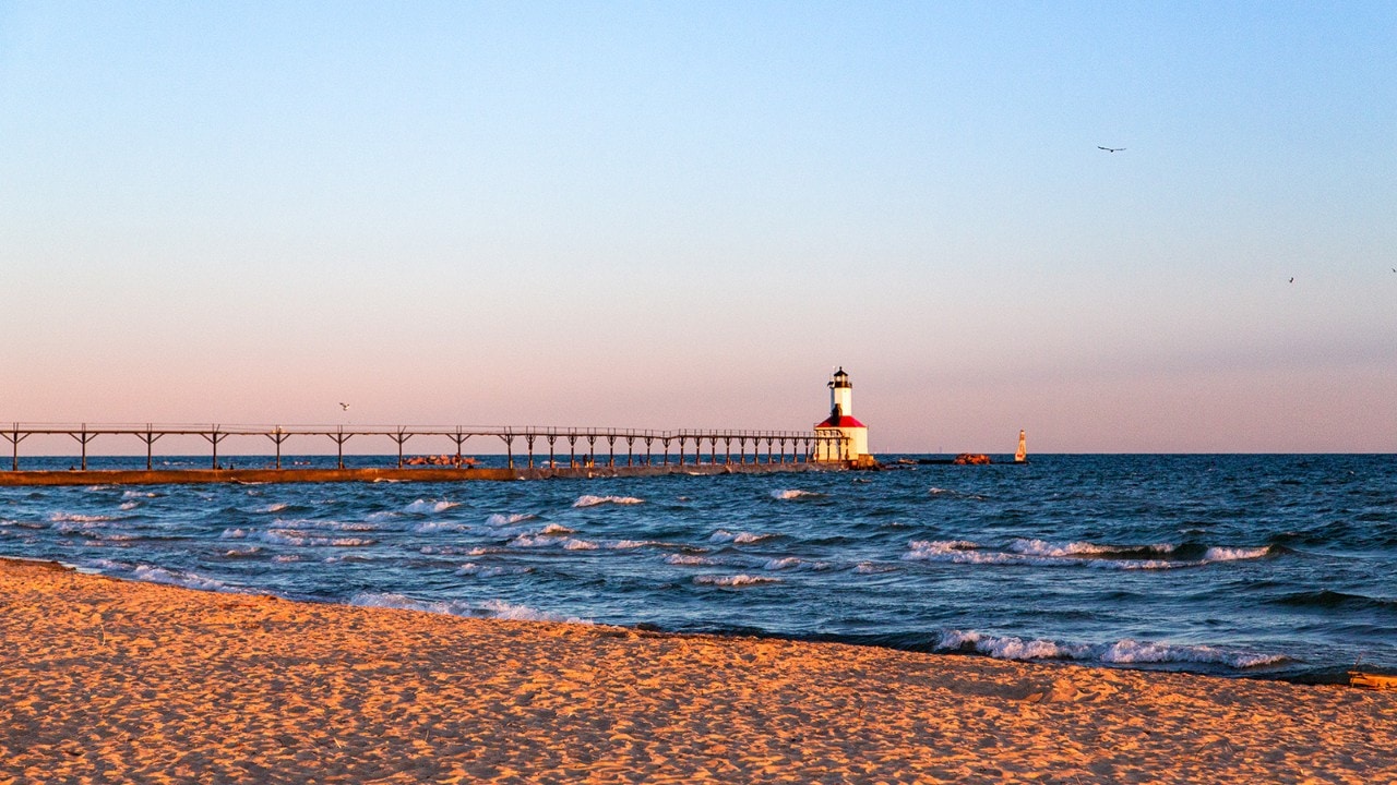Early morning is a great time to explore the nearby Michigan City Lighthouse.