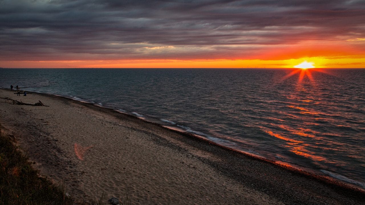 The sun sets on Lake Michigan.