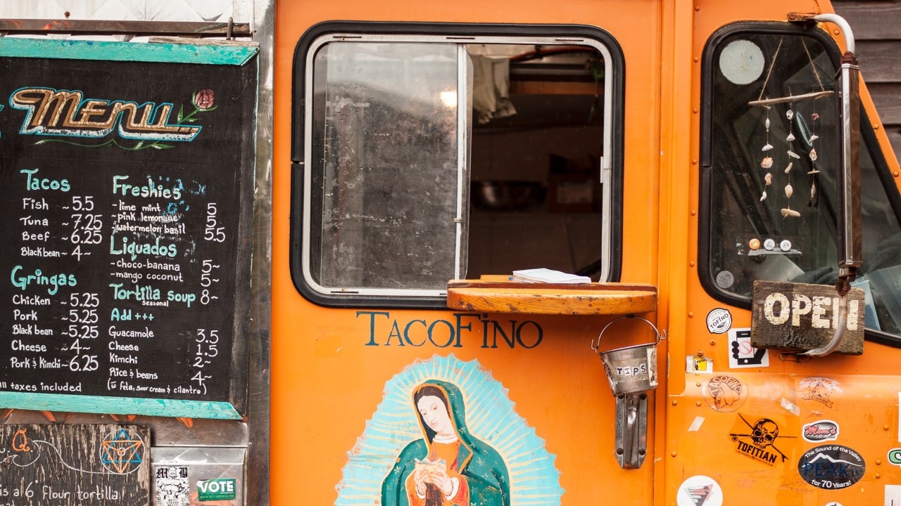 The colorful taco truck is easy to spot.