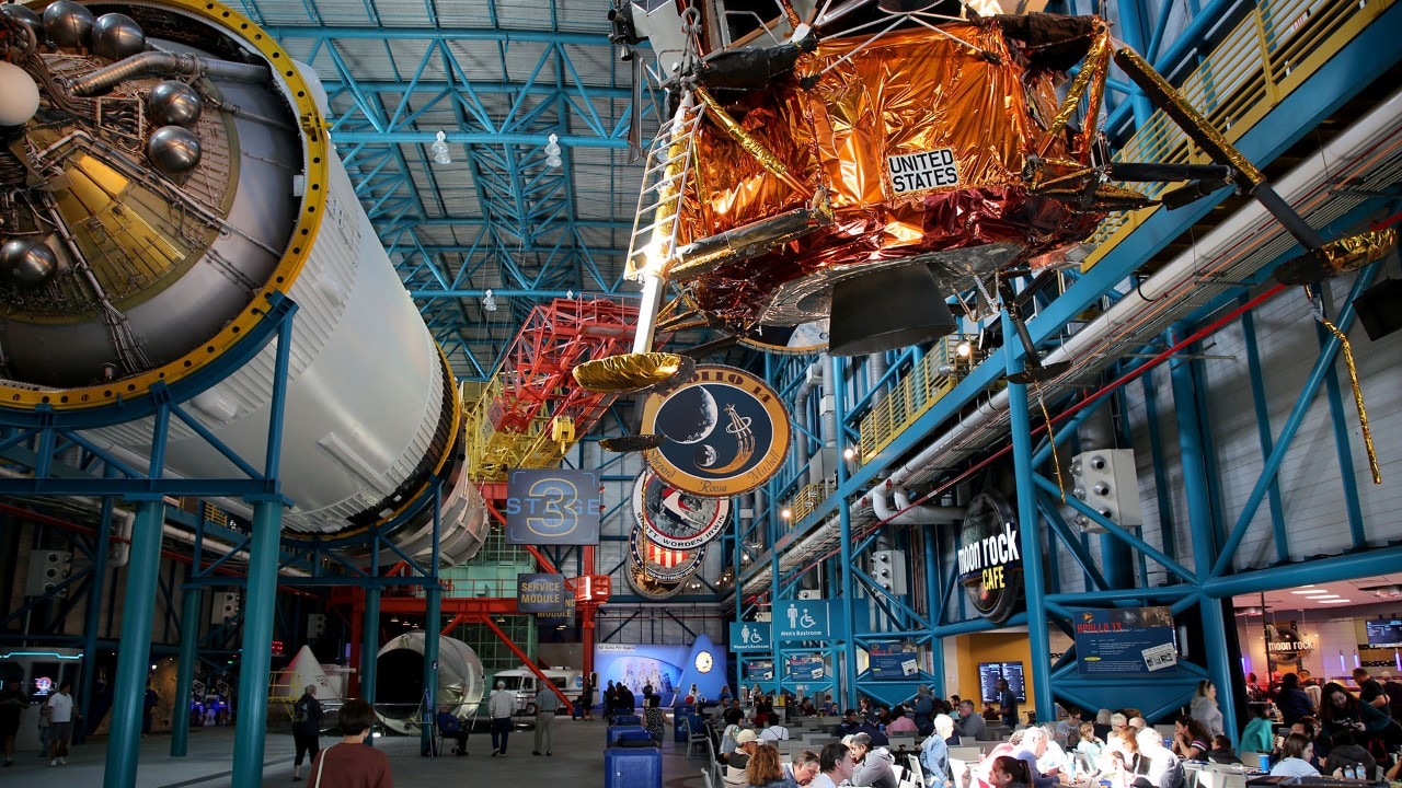 The Apollo/Saturn V Center features a Saturn V rocket, a lunar lander and a moon rock formed 3.7 billion years ago.