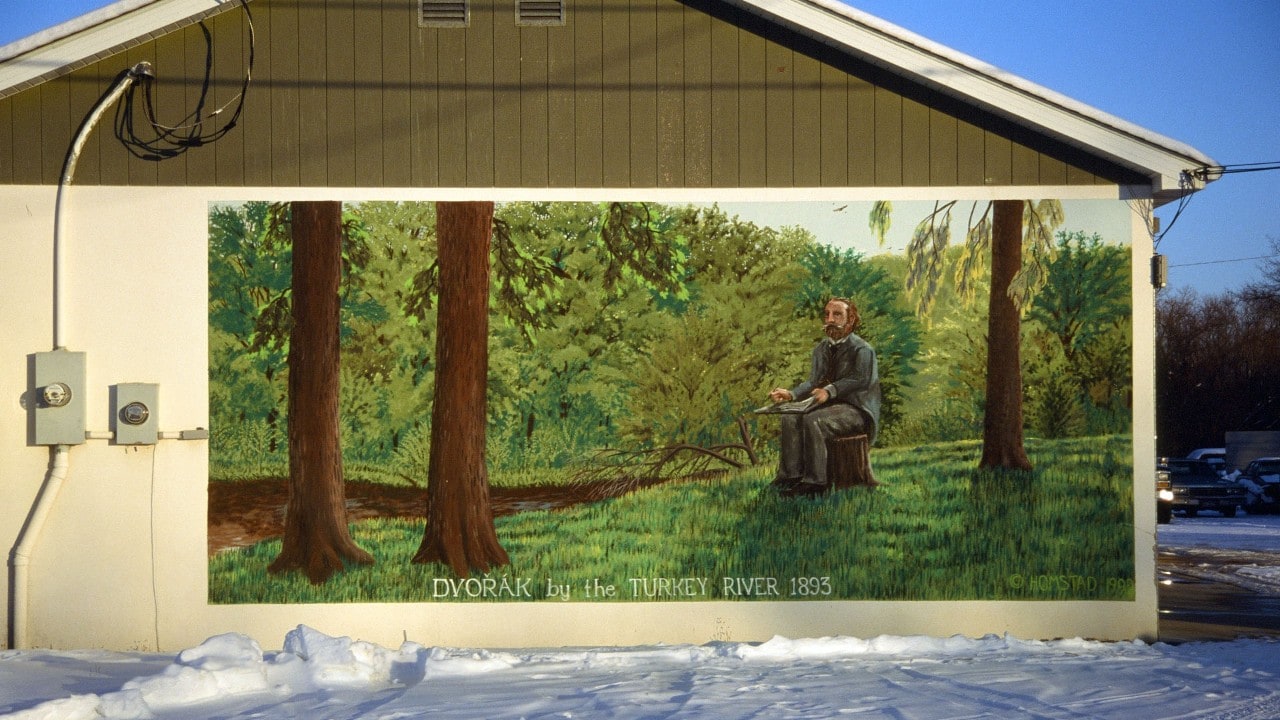 Murals around town depict important events in Spillville's history.