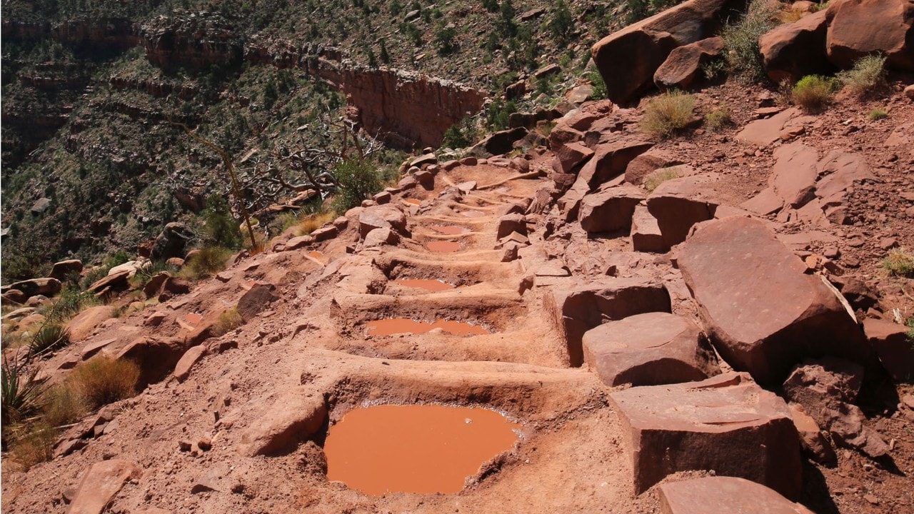 Water fills potholes on the way down on the South Kaibab Trail.