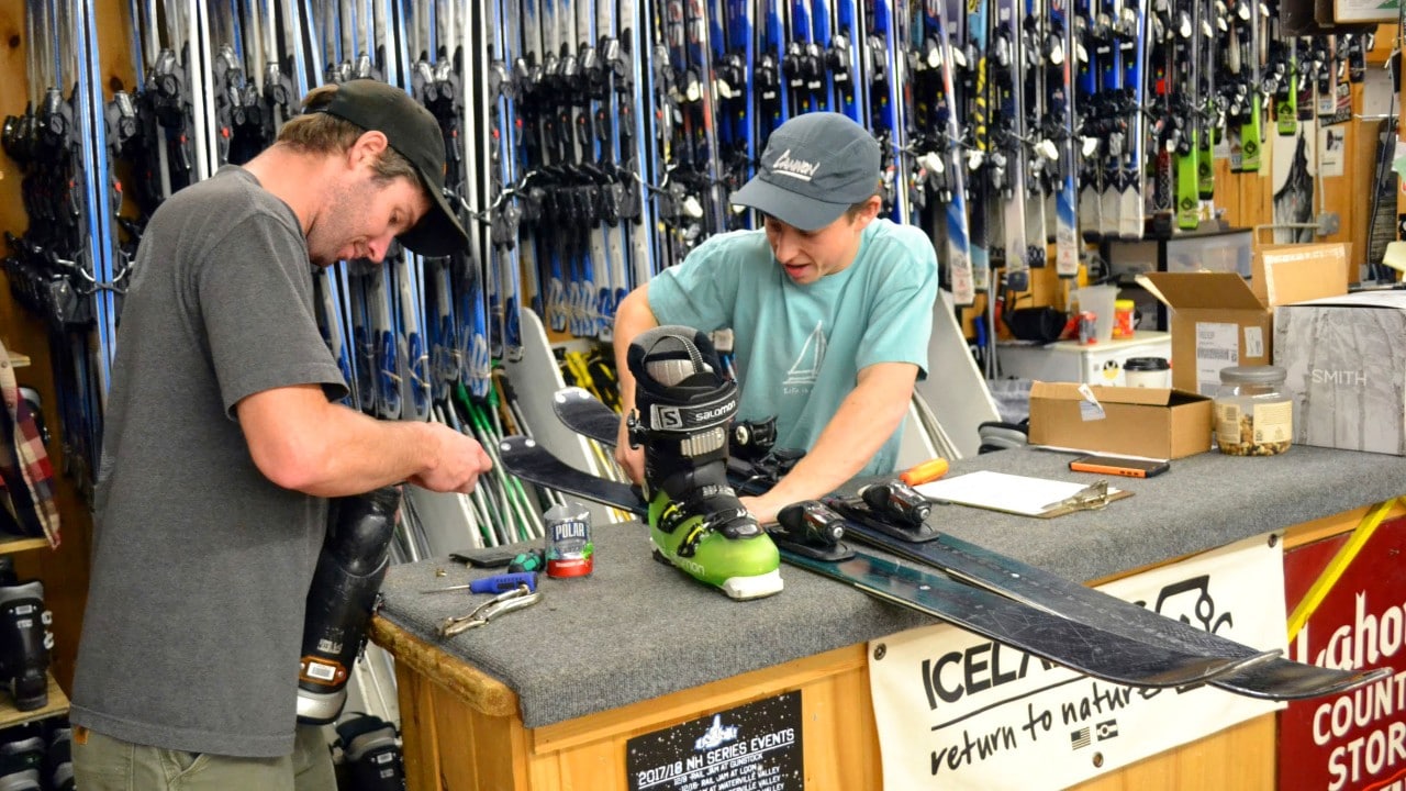 Erik Golkowski and Noah Lloyd adjust bindings for a customer at Lahout's.