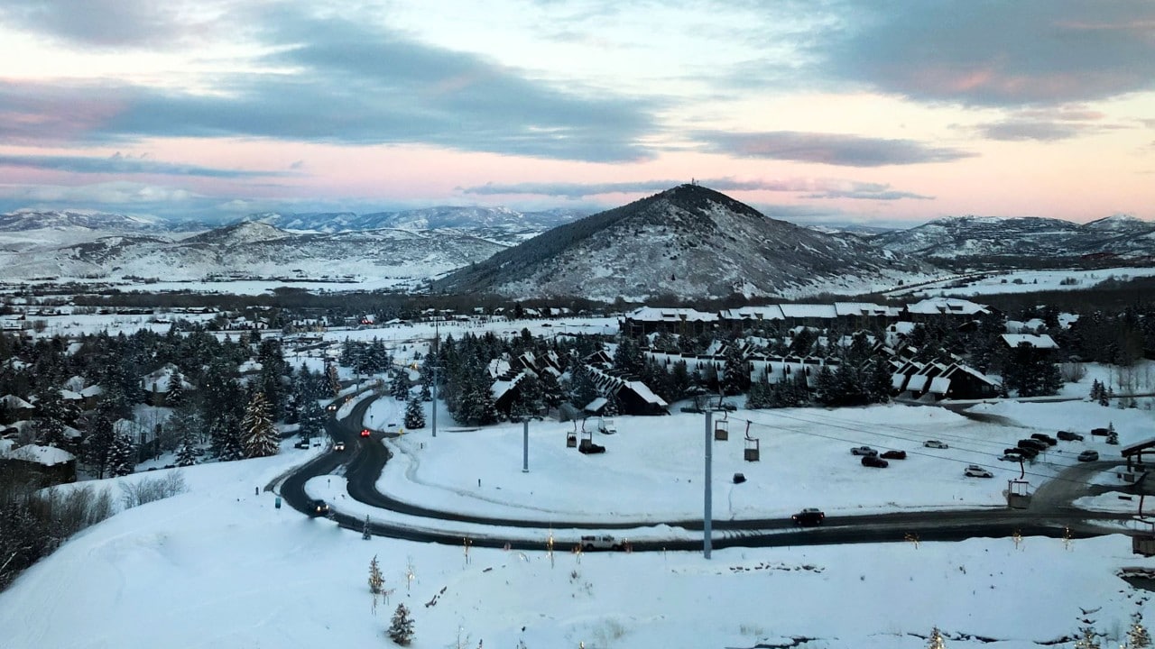 The sun sets on the ski slopes in Park City.