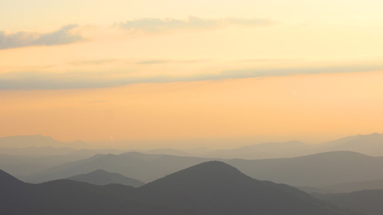 Mountains disappear into darkness after a beautiful, hazy sunset seen from Max Patch. Photo by Emanuel Vinkler