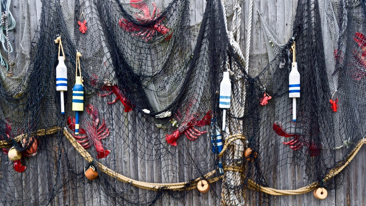 Faux lobsters, nets, buoys and ropes decorate many walls.