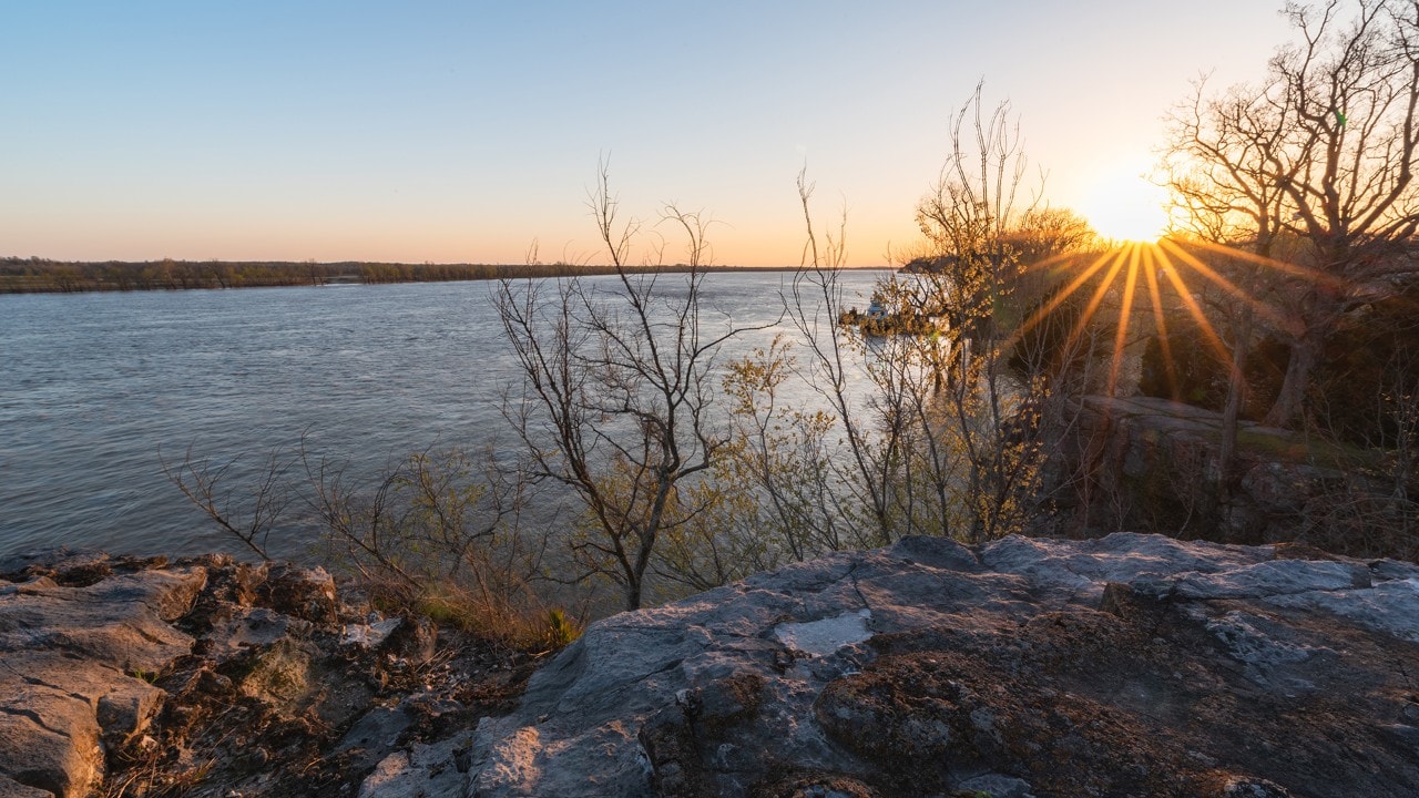 The sun sets over the Ohio River near Cave-in-Rock State Park.