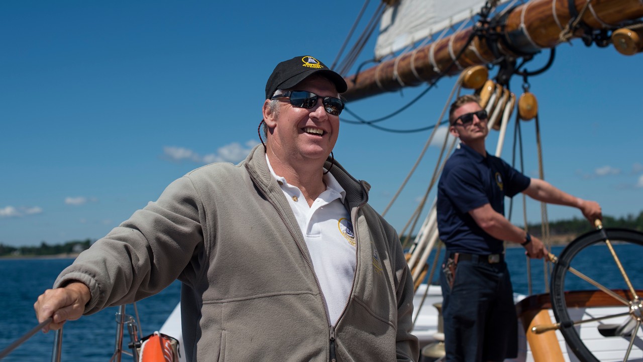 Captain Phil Watson, left, laughs while aboard the Bluenose II in Lunenburg Harbour in Lunenburg, N.S. on Tuesday, June 27, 2017.