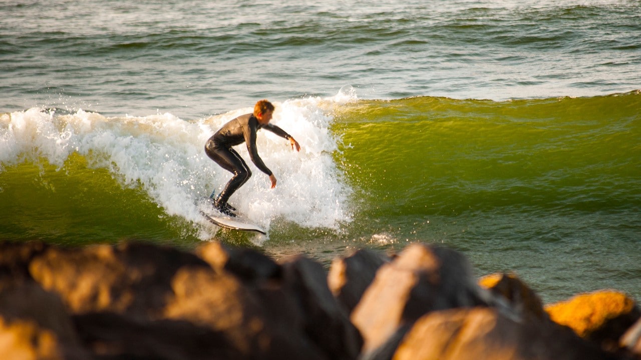 Waves break along the jetties near Westport's marina, offering amazing rides for experienced surfers.