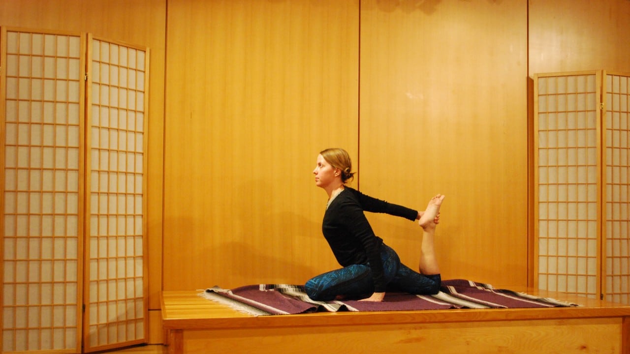 Striking a yoga pose. Photo by Anne Roderique-Jones.