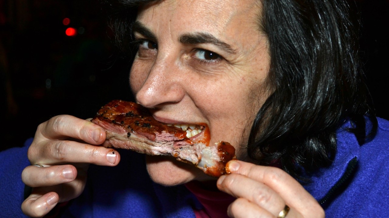 The writer digs into a rib at Texas Jack's.