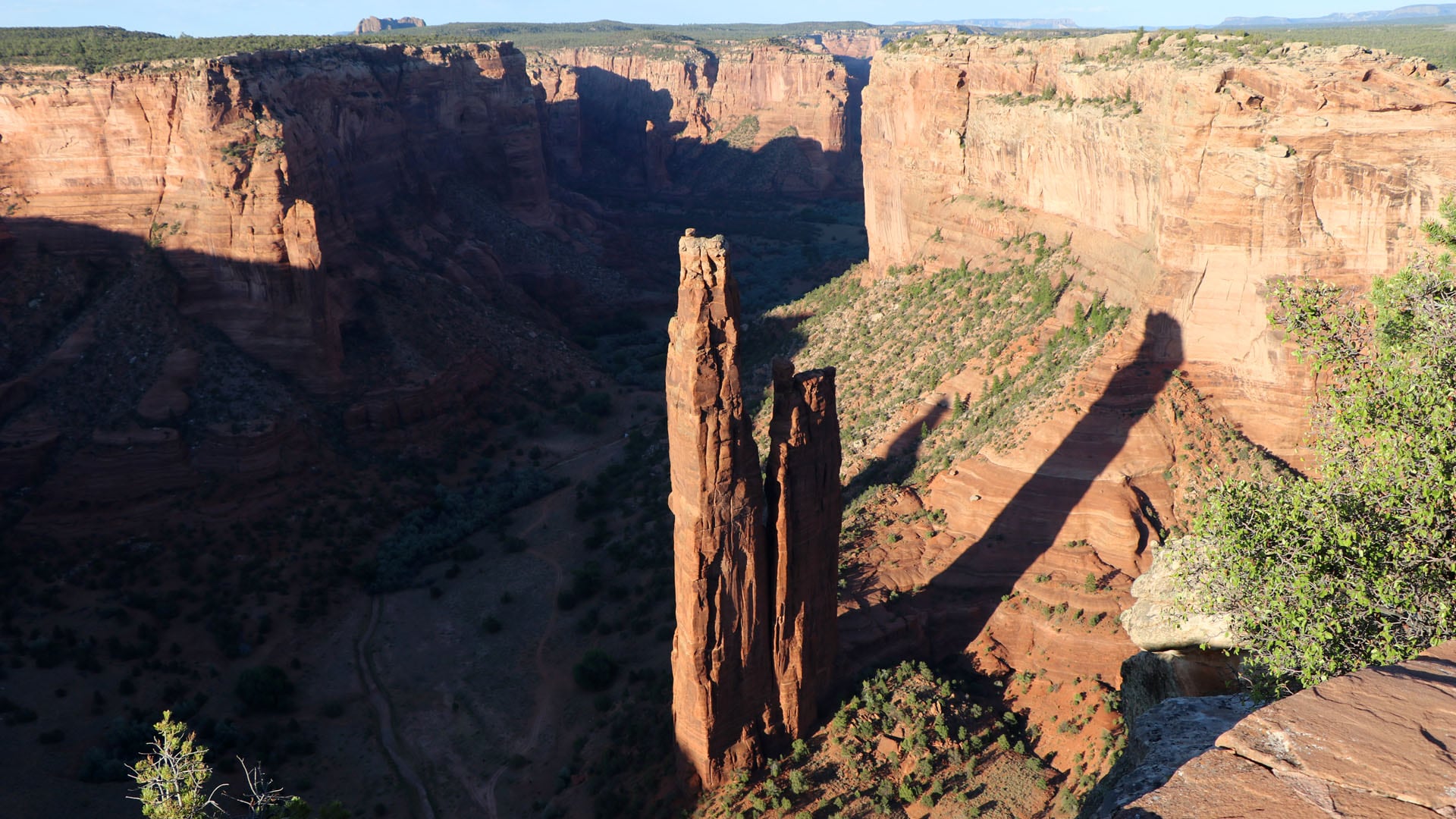 Spider Rock casts a long shadow as the sun sets on Canyon de Chelly.