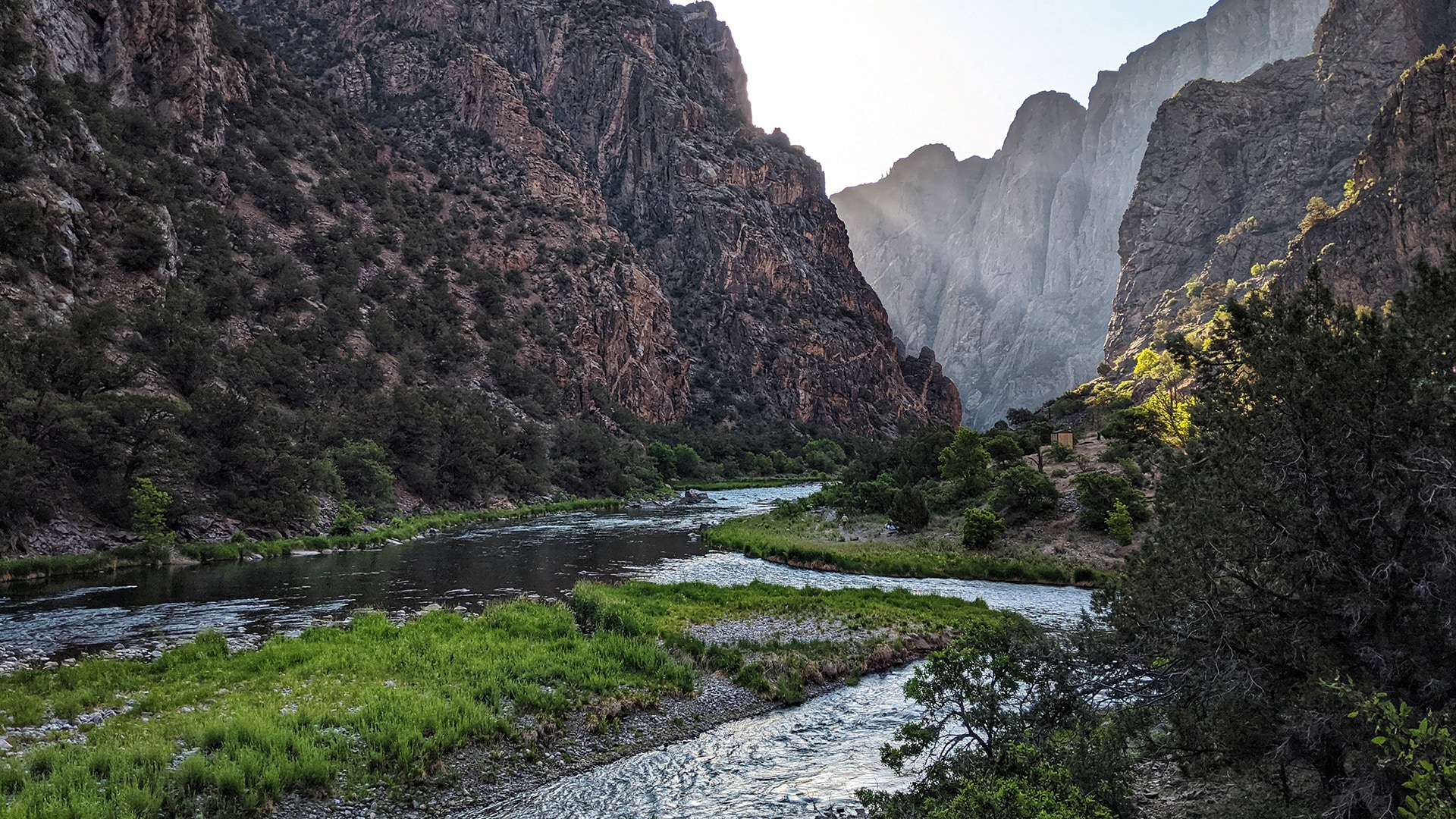 Morning light streams into the Black Canyon of the Gunnison.