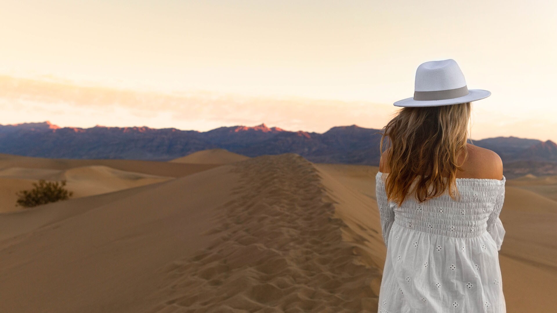 The author watches the sun rise at Mesquite Flat Sand Dunes in Death Valley National Park.