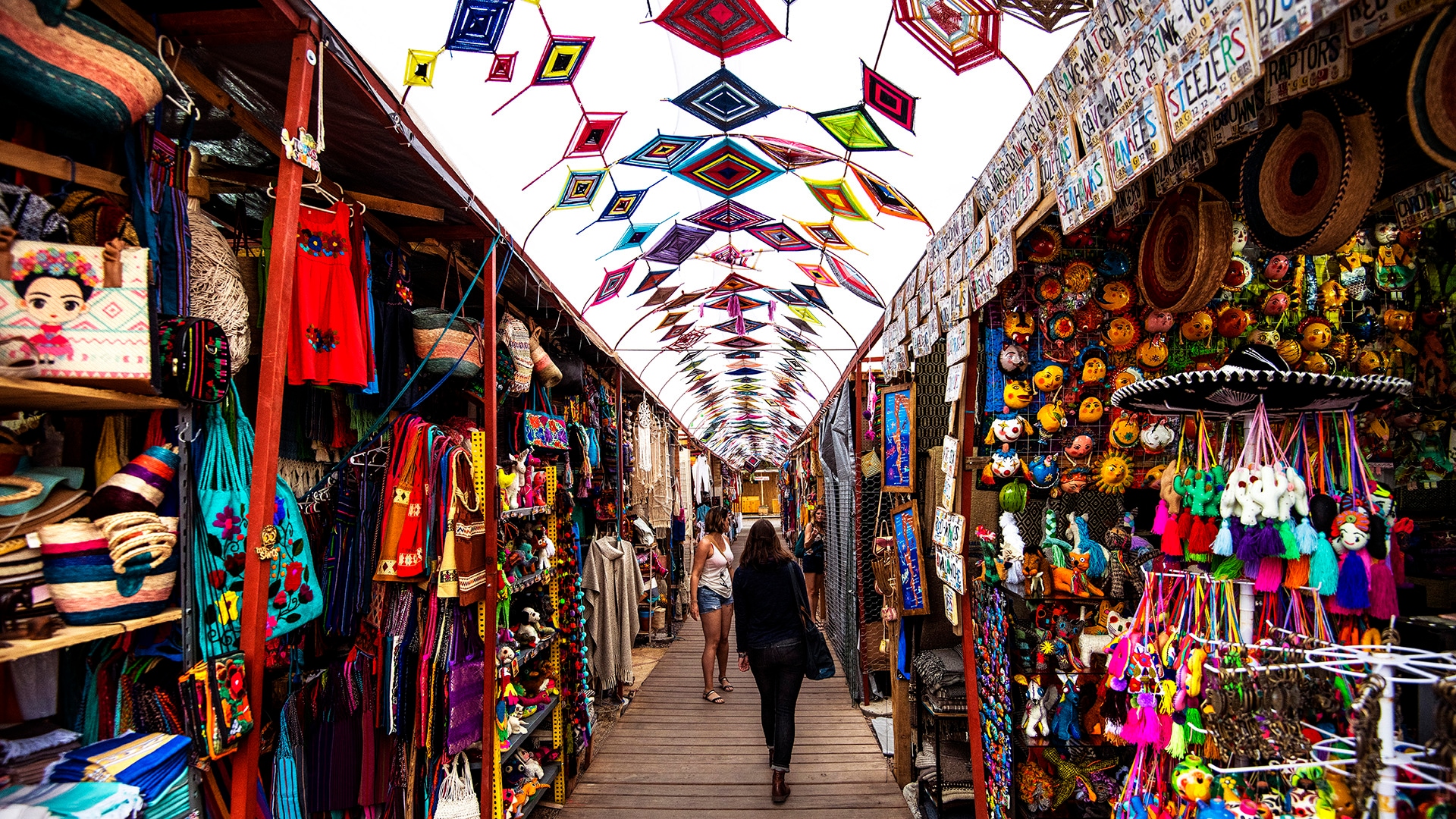 Writer Kassondra Cloos walks through an arts and crafts market in central Todos Santos.