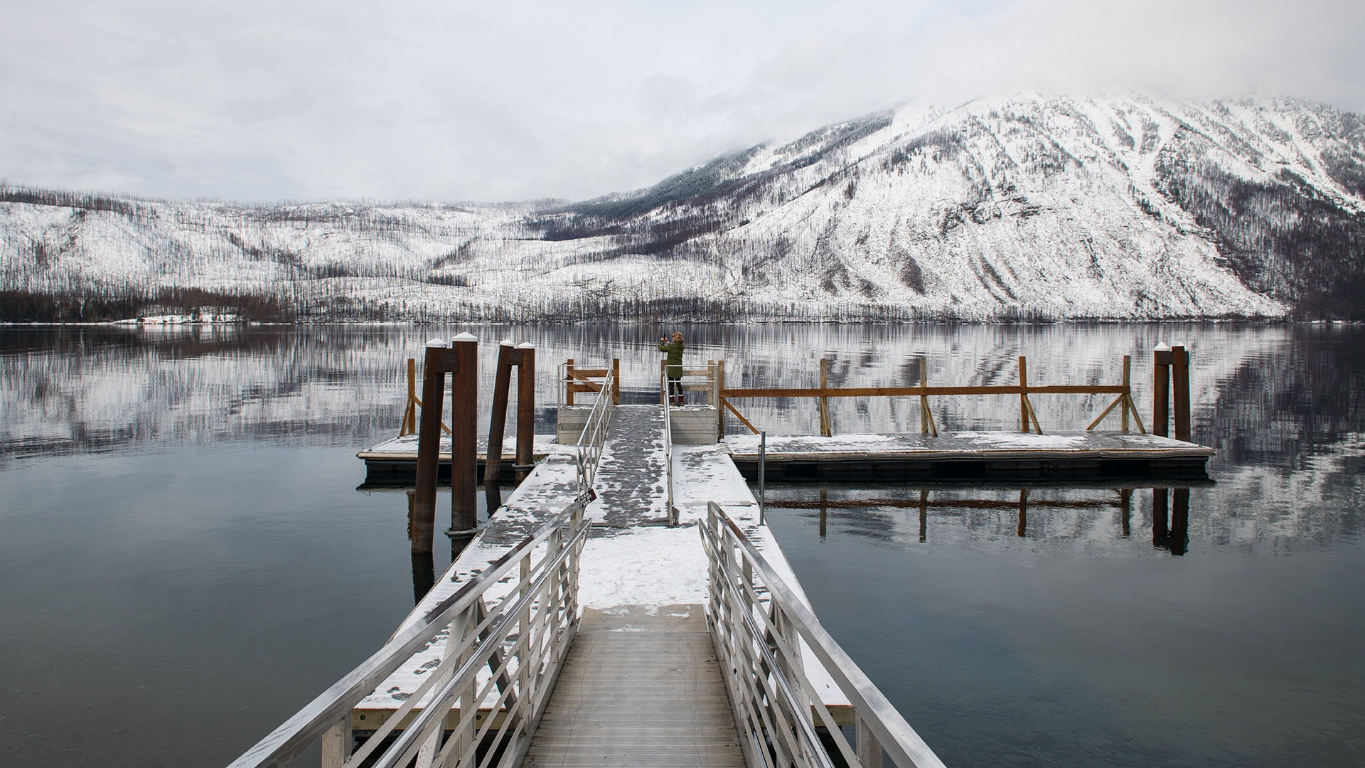 Visitors can still access the Lake McDonald pier in winter, even though the lodge is closed.