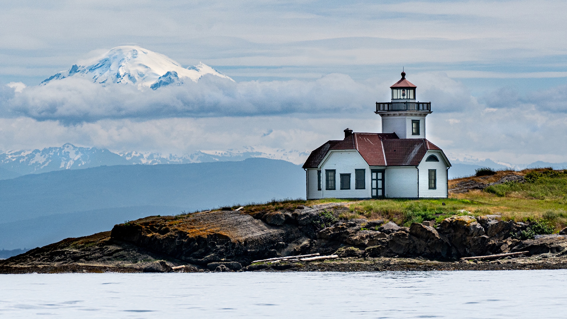 Patos Island Lighthouse helps ships navigate the Straight of Georgia and offers great views of Mount Baker in the distance.