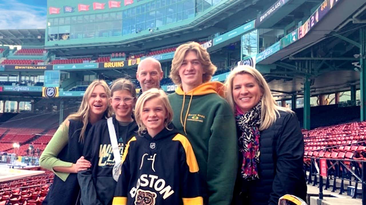 The Maher family poses for a picture at Fenway Park.