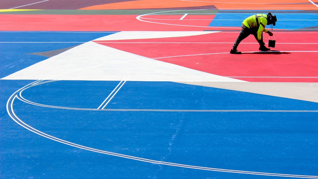 The finishing touches: court lines.