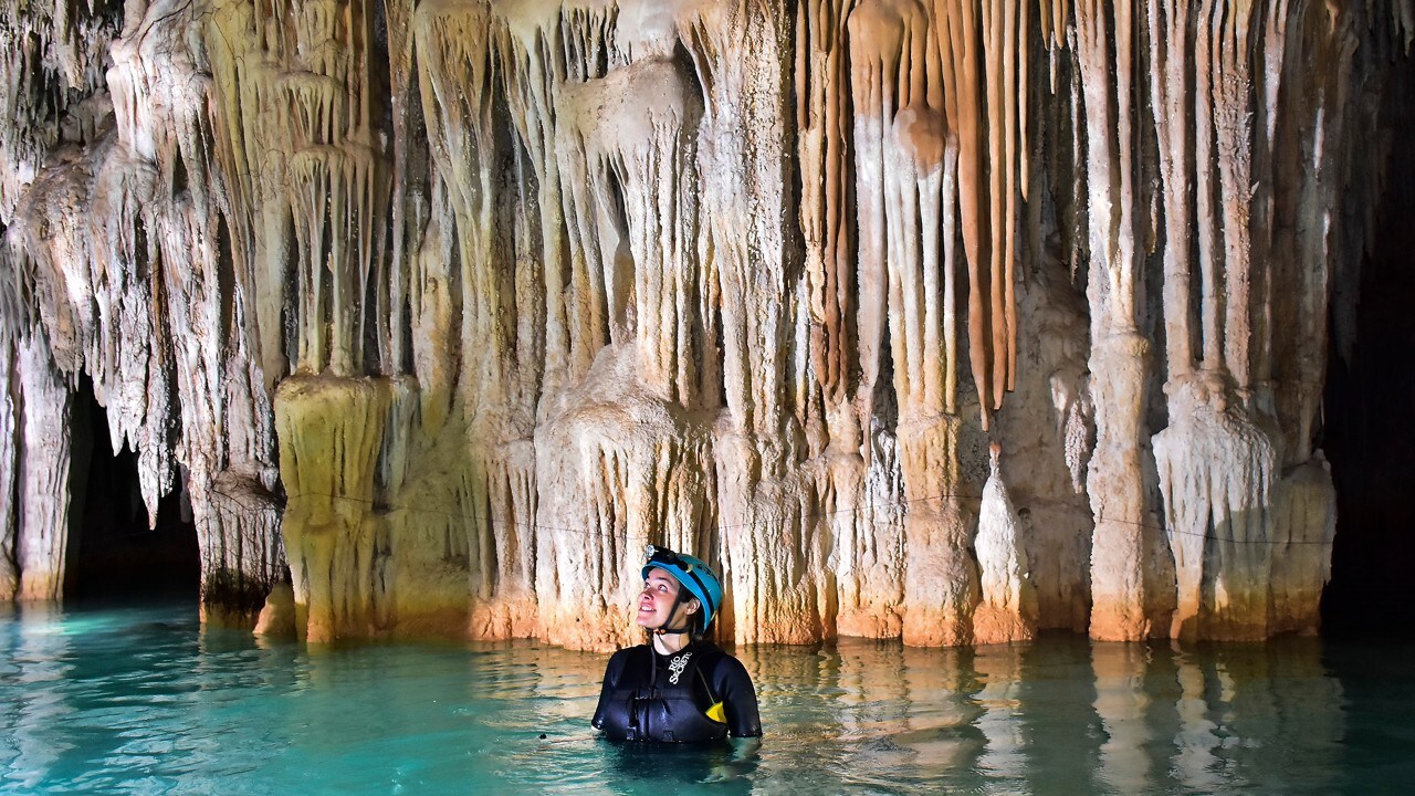 Kassondra marvels at the natural beauty in Rio Secreto. Photo courtesy of Michael Ciaglo