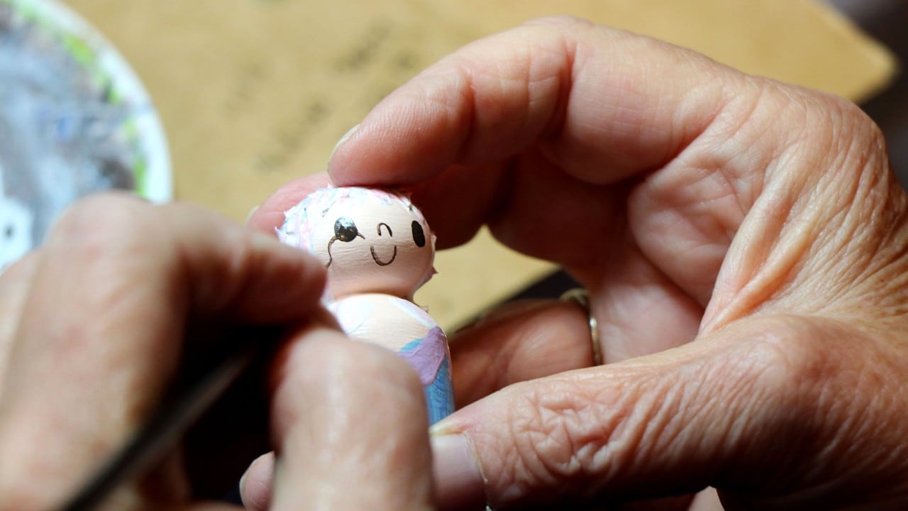  An artist demonstrates her craft at the Folk Arts Center at Asheville.