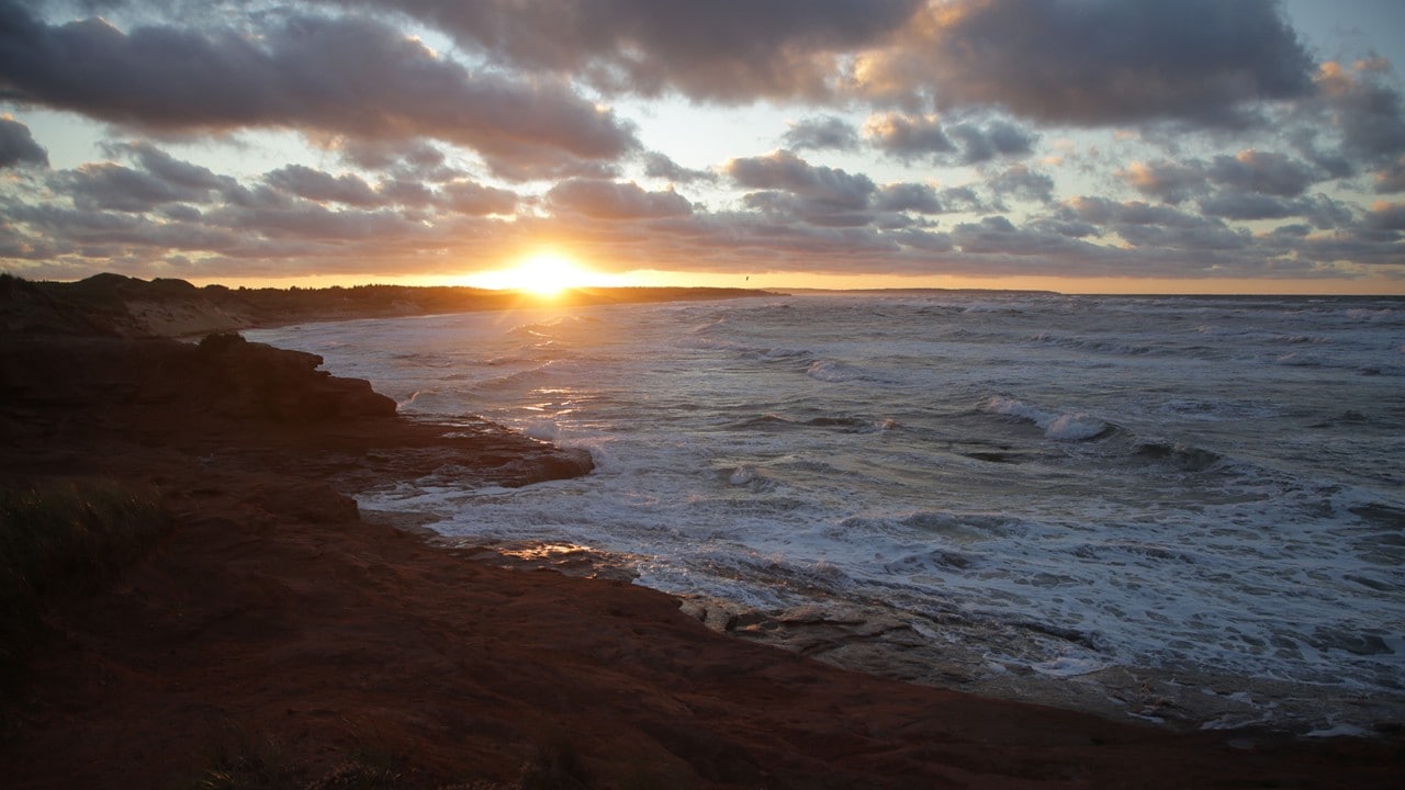 The sun sets along the Cavendish shore.