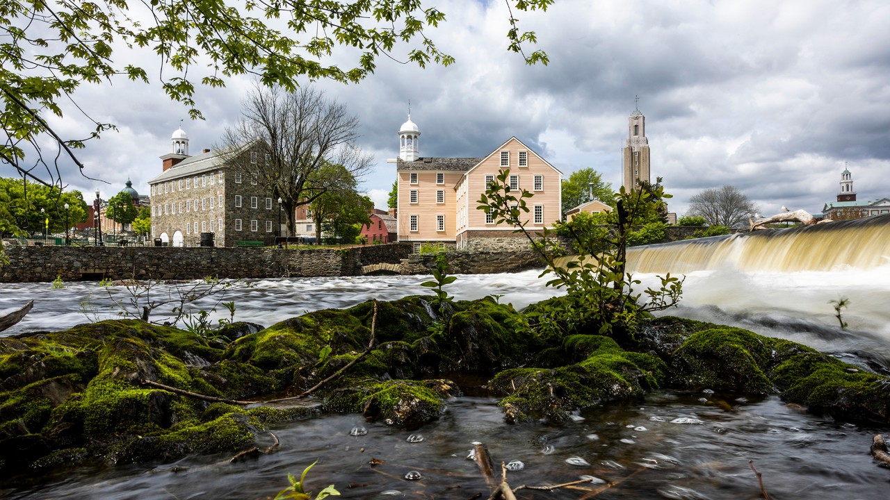 The Slater Mill is a historic textile mill complex on the banks of the Blackstone River in Pawtucket, a city in Providence County.