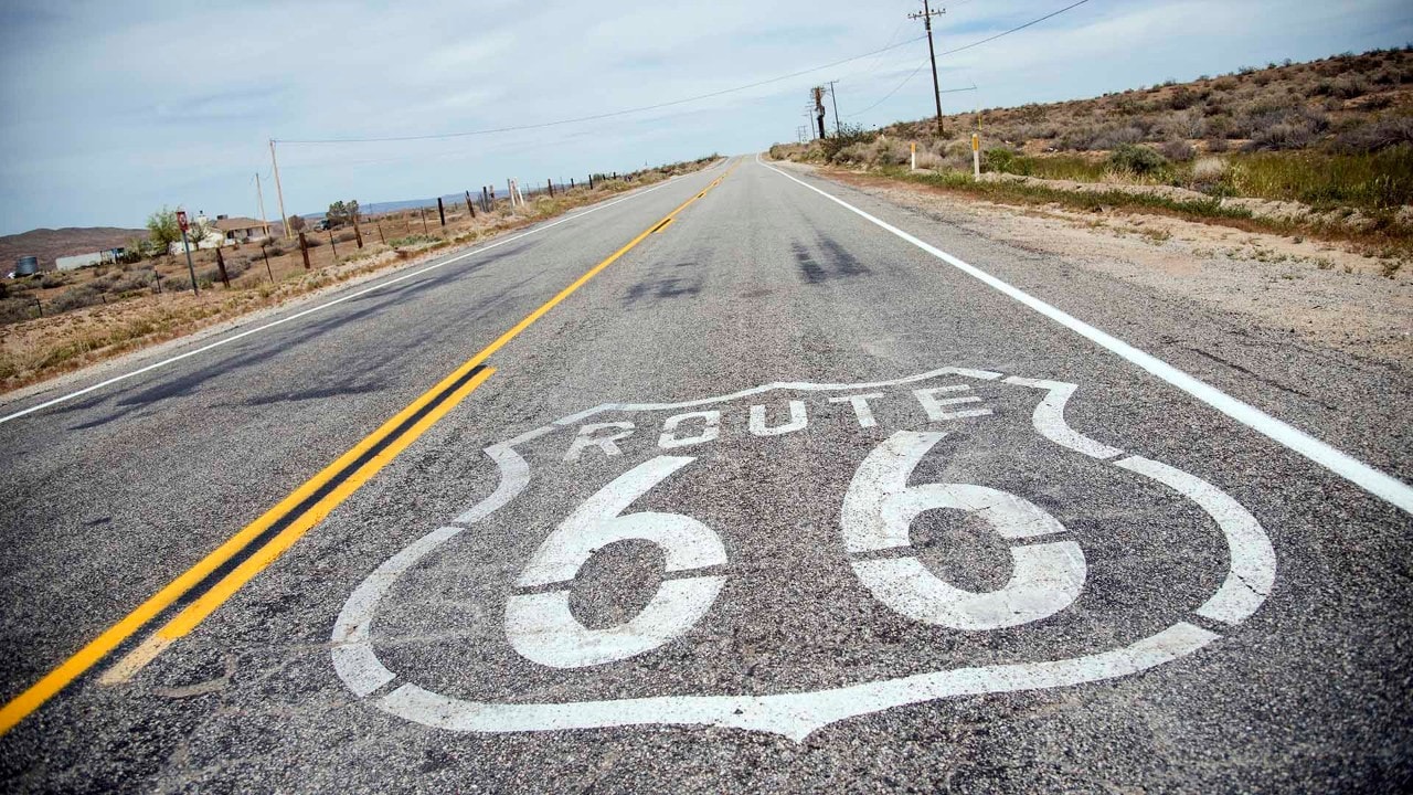 The world-famous Route 66 insignia decorates sections of the "Mother Road" like this one south of Barstow, California
