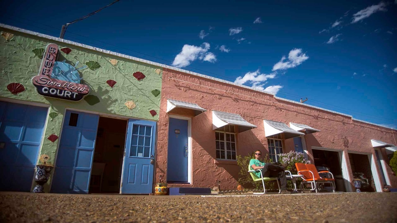 The author sits outside his room at the Blue Swallow Motel in Tucumcari, New Mexico.