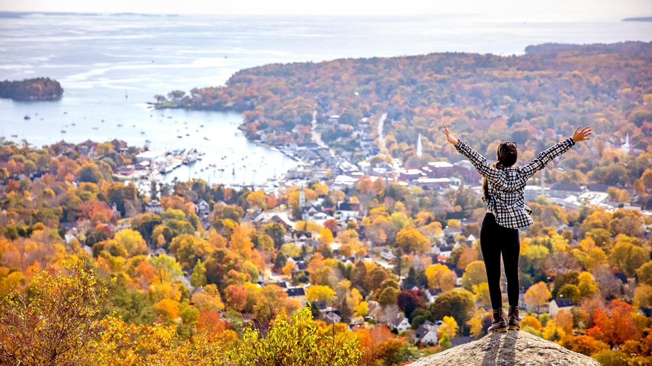 While climbing Mt. Battie, Sarah Lozano takes in the view over Camden.