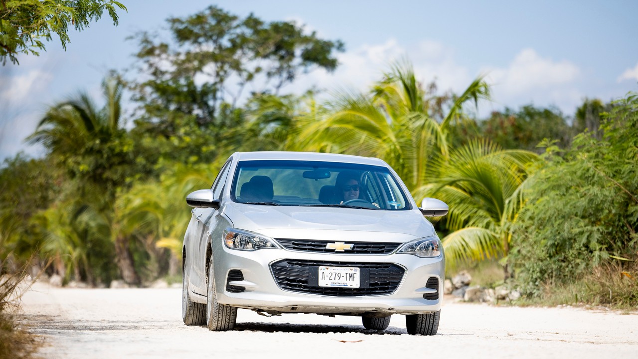 The author drives her Chevrolet Cavalier rental car to Playa Xpu-Ha. 