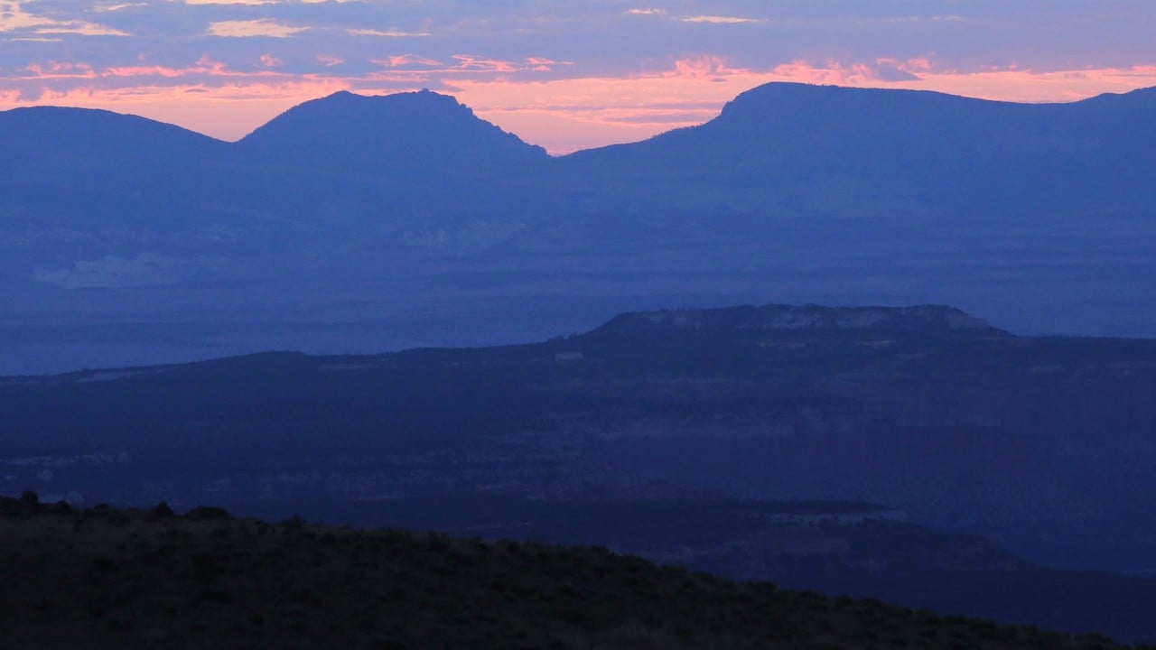 The Homestead Overlook features purple hues at sunrise.