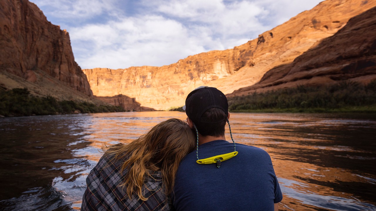 Anna rests her head on Ryan’s shoulder during a rafting tour of Glen Canyon.
