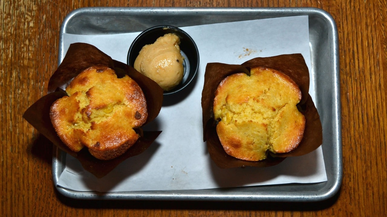 Maple butter with orange zest complements the excellent cornbread at Myron Mixon's.