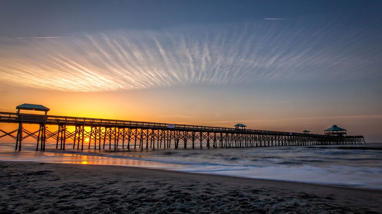 The sun rises at Folly Beach near Charleston, South Carolina.