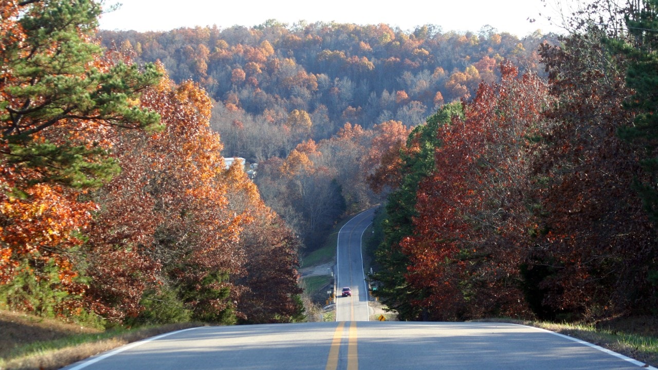 The two-lane blacktops that roll through the Mark Twain National Forest are part of the fun of exploring the scenic wonders of the Ozarks.