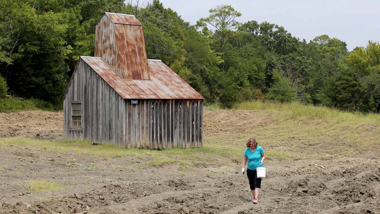 Diane Williams searches near the Mine Shaft Building.