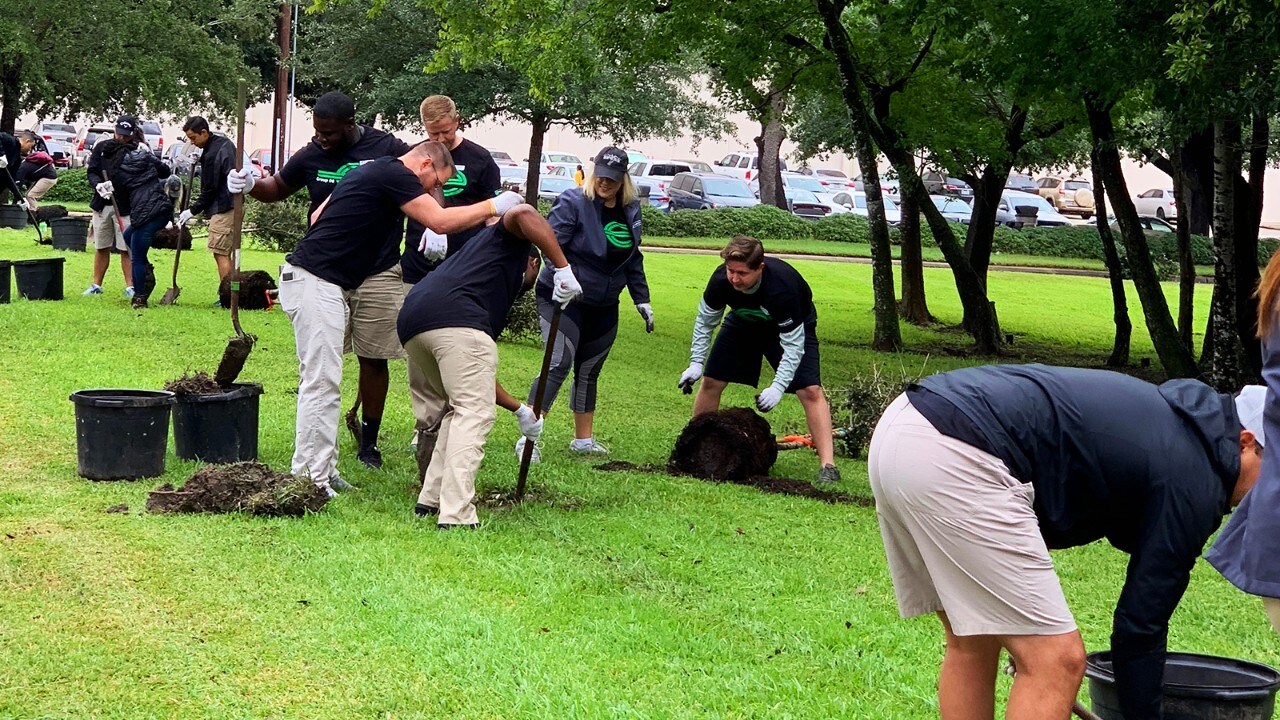 Volunteers get to digging at Pin Oak Middle School in Houston, Texas.