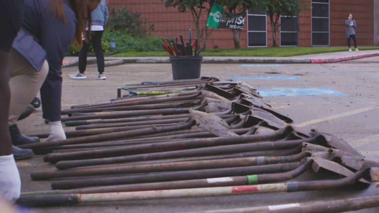 Event organizers get shovels and gear ready for planting.