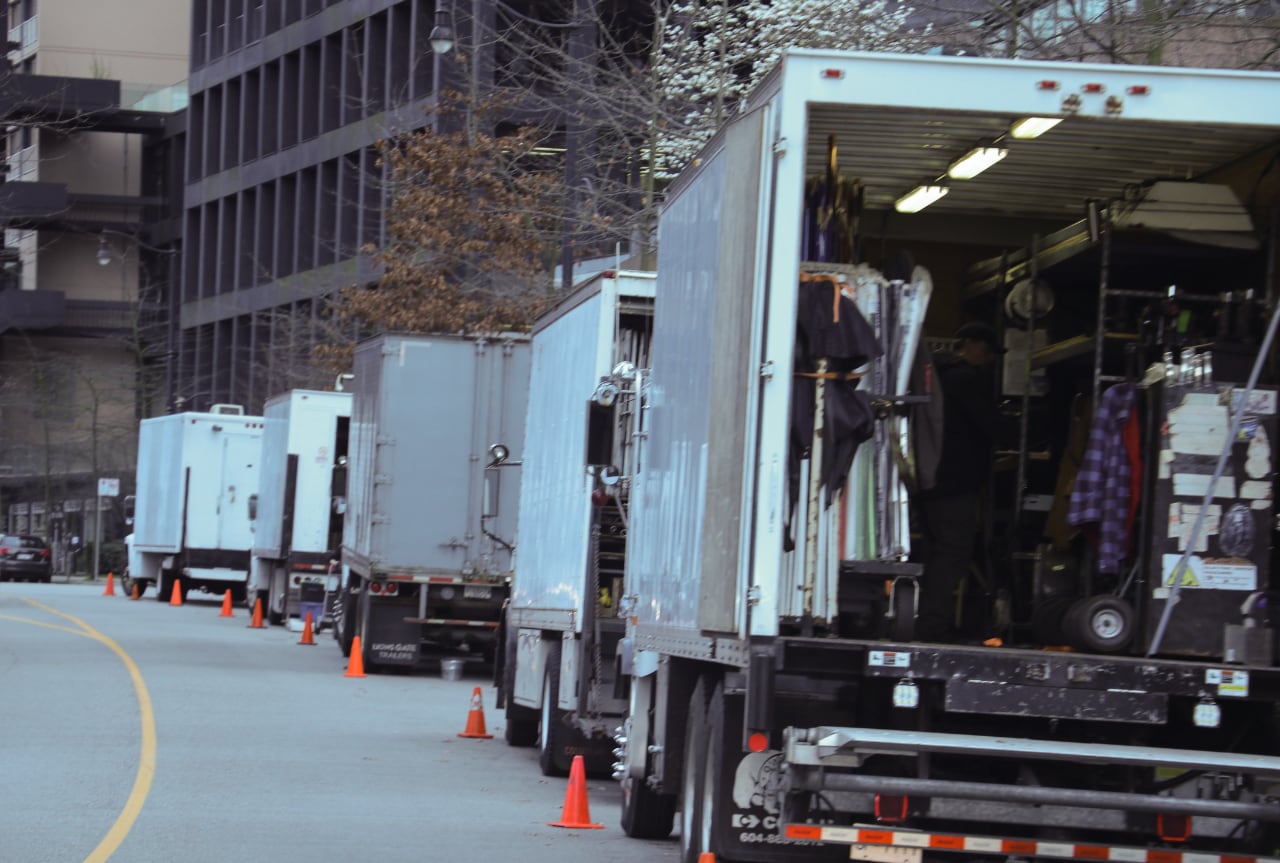 Movie set trucks line Pender Street in Vancouver. Vancouver is known as the Hollywood North.